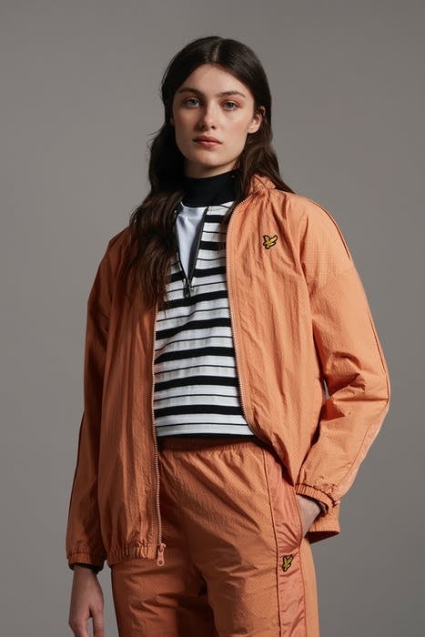 PERFORATED FUNNEL NECK JACKET DUSK ORANGE 1