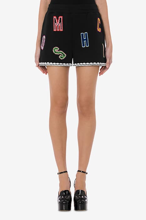 CROCHET LETTERING ORGANIC FLEECE SHORTS BLACK by Moschino